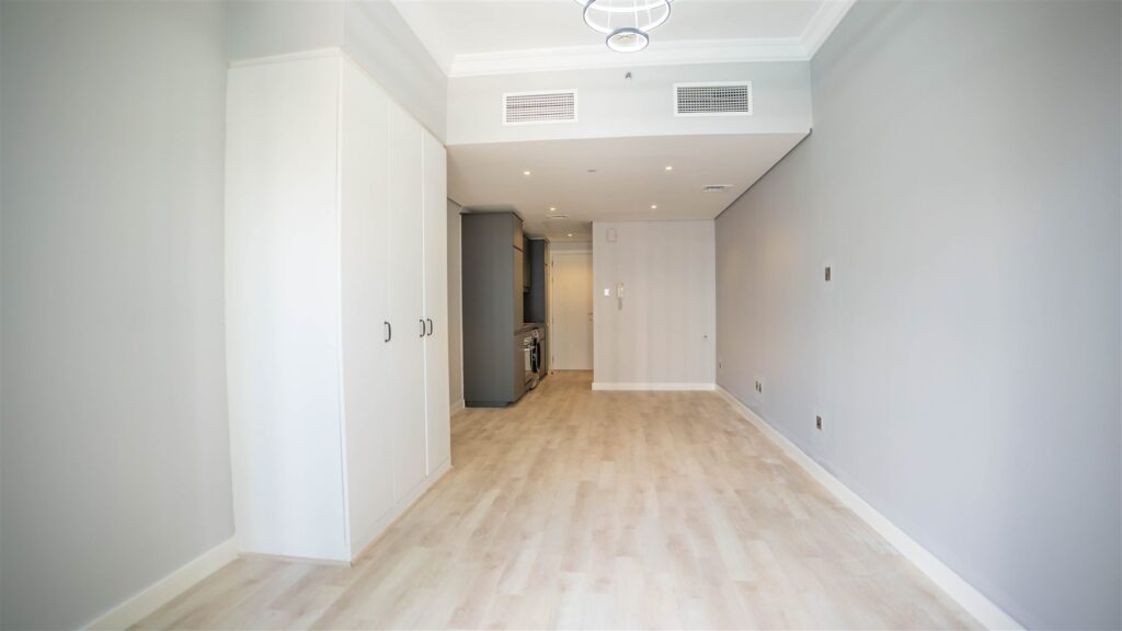 Room and wardrobes after the renovation, Lake View Tower, JLT
